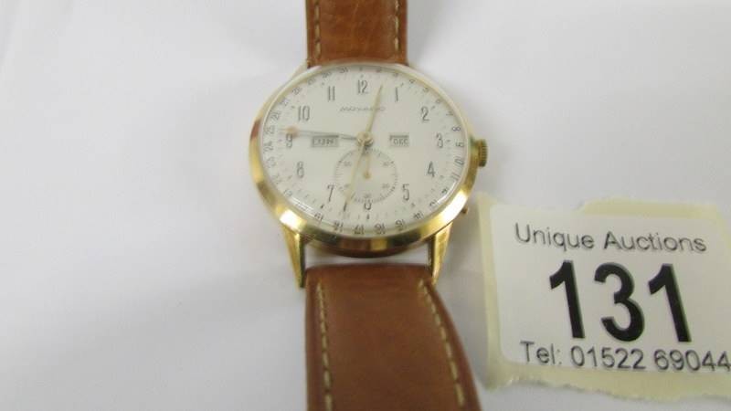 A Movado 18ct gold 1950's gent's wrist watch, fully serviced. Watch is genuine, there is no - Image 3 of 6