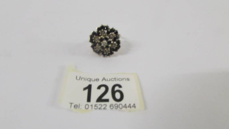 A large yellow gold sapphire and diamond ring, size O. - Image 3 of 6