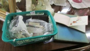 A mixed lot including albums of photographs, autograph with drawings etc., cigarette cards, music