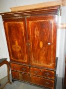 A mahogany inlaid drawer base cupboard.