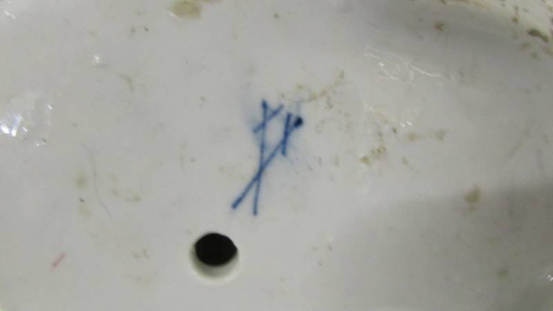 A pair of fine porcelain male and female figure/sweet meat dishes with crossed swords mark. - Image 6 of 9