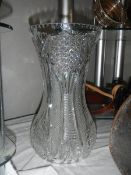 A heavy cut glass vase, 31 cm. Collect only.