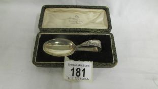 A Mappin & Webb hall marked silver babies feeding spoon, boxed.