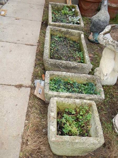 2 broad rectangular plant troughs (63 c 42 x 23 cm) and 2 smaller planters (collect only).