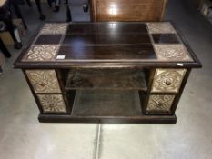 A dark wood stained coffee table with 4 drawers & 2 shelves - 92cm x 51cm x 50cm high