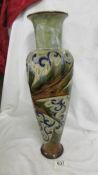 A Doulton 17" high vase with a floral design. 301 M.V.M. and another mark.