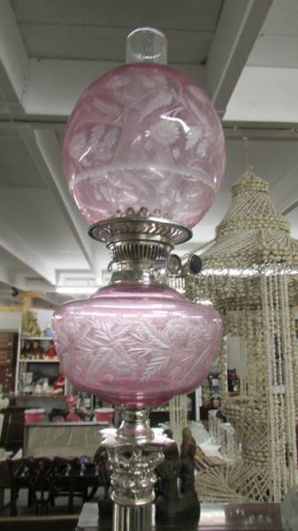 A silver plated Corinthian column oil lamp with pink glass font and shade. Collect only. - Image 3 of 3