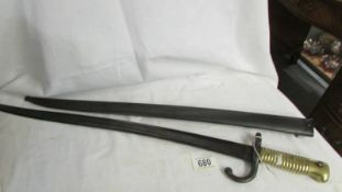 An old bayonet in sheath.