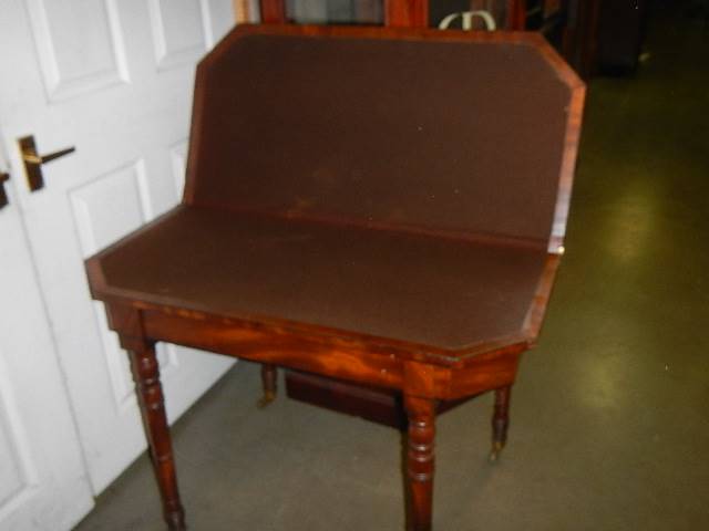 A Victorian mahogany fold over card table. - Image 3 of 3