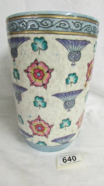 A wide Bursley ware vase by Charlotte Rhead. White dapple ground with blue thistles, red roses and - Image 3 of 3