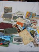 A mixed lot of postcards.