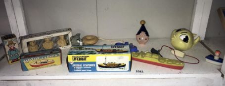 A boxed clockwork life boat & motor launch & 1970's Tom Cat soap holder & novelty soap etc,