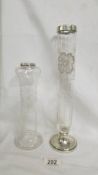 One tall glass vase with silver rim and one other with unmarked rim which appears silver