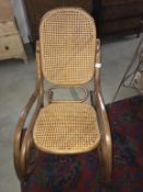 A Bentwood rocking chair with Bergiere seat and back panel