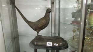A spelter pheasant.