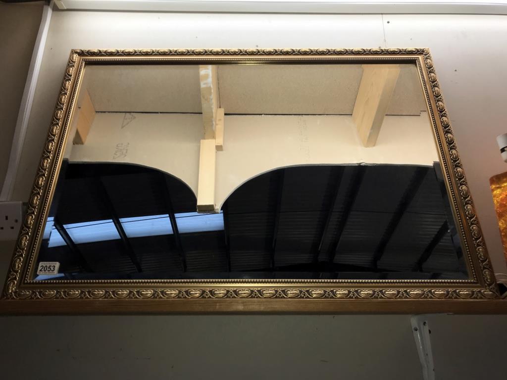 A large gilt framed bevel edge mirror (96cm x 97cm) (Collect only)
