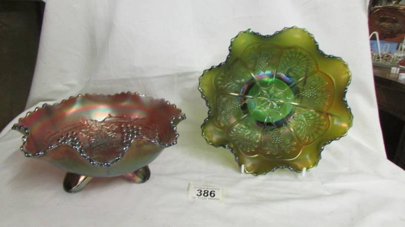 Two carnival glass bowls - Northwood amethyst grape & cable and a Fenton green peacock & grapes.