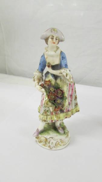 A pair of small continental porcelain figures and two others. - Image 2 of 7