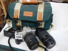 A Canon camera and lenses.