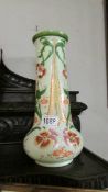 A Victorian hand painted glass vase.