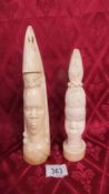 Two antique ivory carved tribal head figures. Heights 27.25cm & 23cm.