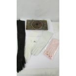 A vintage evening bag and four pairs of ladies gloves including kid. All pieces in good condition.