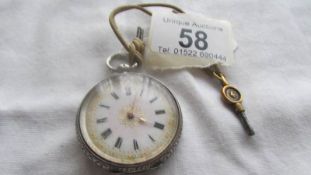 A Victorian ladies silver fob watch in working order.