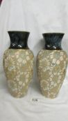 A pair of Doulton Slater vases, 27cm, both in good condition. Collect only.
