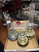 A collection of oil lamp parts including Chimney fonts etc.