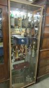 A mid to late 20th century two door display cabinet.