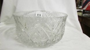 A heavy cut glass bowl, 25 cm diameter x 14 cm deep. Collect only.