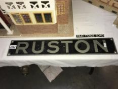 A cast steel 'Ruston' sign