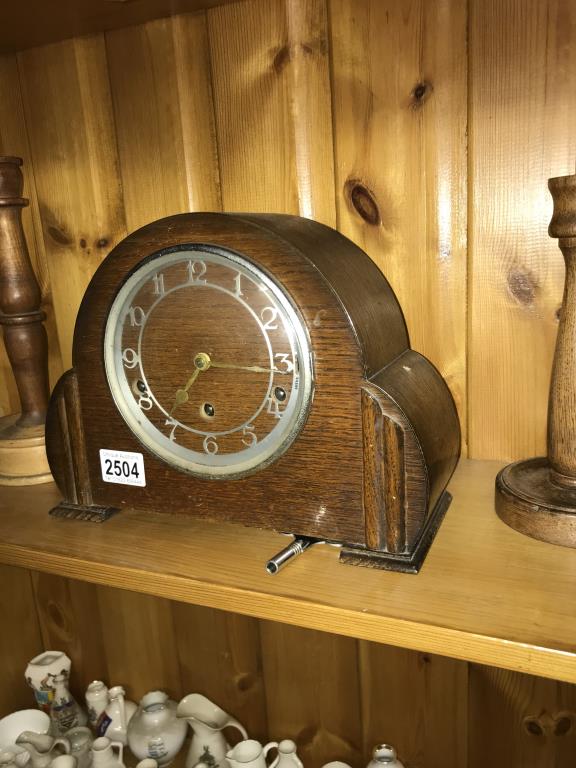 An Art Deco good working Westminster chime clock with winding key and 2 pairs of turned wood - Image 4 of 4