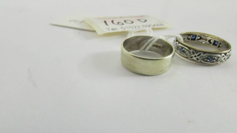 A 9ct gold wedding ring and an unmarked eternity ring, size N. - Image 3 of 3