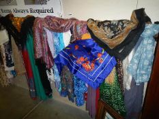 A mixed lot of silk and other scarves/