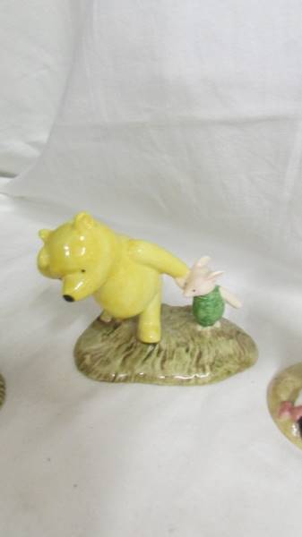 Eight Royal Doulton Winnie the Pooh series figurines. - Image 6 of 9