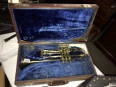 A B&M Champion trumpet in case