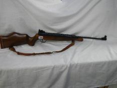 Air arms 0.177 cal, side lever, walnut stock, serial 22910. Collect only.