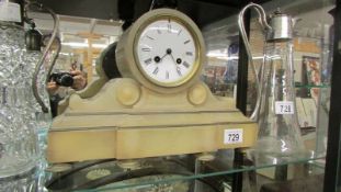 An 8 day alabaster mantel clock. Collect only.
