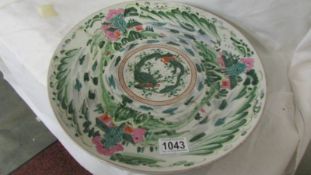 A 19C Chinese hand painted charger with impressed makers mark, 33.5 cm diameter. Collect only.