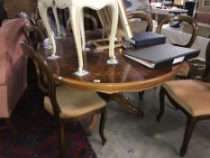 A dark wood stained extending dining table with inlaid top 157cm x 120cm x Height 78cm extended/