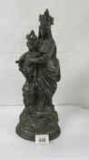 A French spelter figure of the Madonna and child.