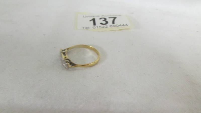 A diamond art deco ring, diamonds set in platinum and 18ct gold, stamped, size L. Weight 2.1g - Image 2 of 2