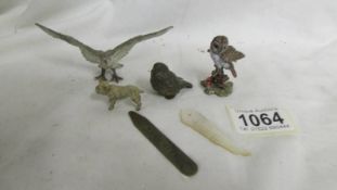 A miniature bronze bird, a painted owl, an eagle, a dog etc.,