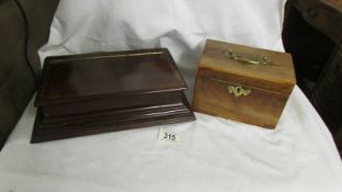 A mahogany tea caddy with brass fittings and another mahogany box.