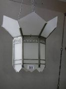 An original art deco ceiling light with shaped frosted glass panels, in good condition. 52cm drop.