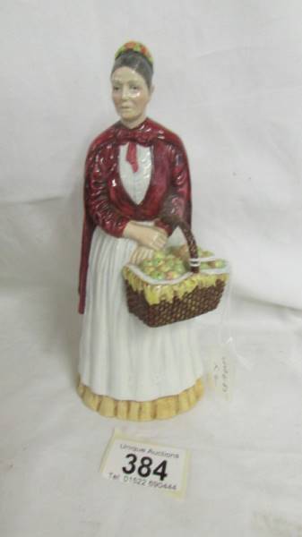 A Coalport figurine 'The Apple Lady',