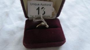 An 18ct gold diamond solitaire ring, size M. Weight 2.6g