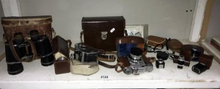 A collection of vintage camera items including Voightlander Prominent & Voightlander accessories &
