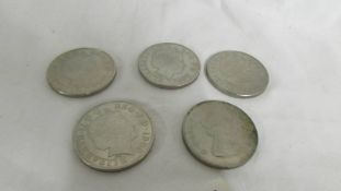 Four Five pound coins and a 1981 Charles and Diana crown.